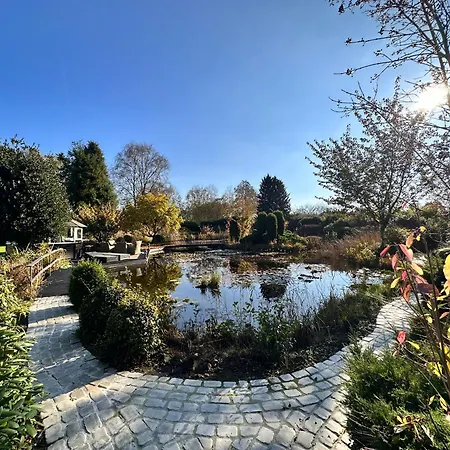 بيت خشبي Wellness Tuin - Boudoir - Ultieme Partner Beleving - Indoor Jacuzzi En Openhaard En Prive Sauna - In Romantische Stijl - Gratis Fles Prosecco & Leuke Partner Connect Box !